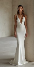 Minimalist satin wedding dress with a deep plunging V-neckline, fitted silhouette, and smooth satin fabric – a sleek and modern bridal choice. | فستان زفاف ساتان أنيق بياقة على شكل V عميق وتصميم انسيابي عصري لحفل زفاف راقٍ | Vestido de novia de satén minimalista con escote en V profundo y silueta ajustada – ideal para bodas modernas. | Robe de mariée en satin minimaliste avec décolleté plongeant et coupe fluide – parfaite pour un look épuré et raffiné.