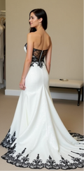 Striking Black and White Corset Mermaid Wedding Dress with Lace Embellishments