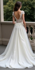 Romantic A-Line Wedding Dress with Illusion Lace Bodice and Flowing Tulle Skirt