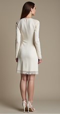 Elegant short bridal dress featuring a sleek, long-sleeve design, lace-trimmed hemline, and tailored fit – a perfect blend of minimalism and luxury. | فستان زفاف أنيق بظهر بسيط وأكمام طويلة مع لمسات من الدانتيل لمظهر راقٍ ومميز | Vestido de novia corto con espalda sencilla, mangas largas de encaje y detalles refinados – sofisticado y moderno. | Robe de mariée courte avec dos sobre, manches longues et finitions en dentelle – idéale pour une mariée chic et distinguée.