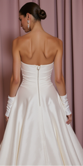 Elegant Strapless Satin Wedding Gown with Modern Cutout Bodice & Gloves